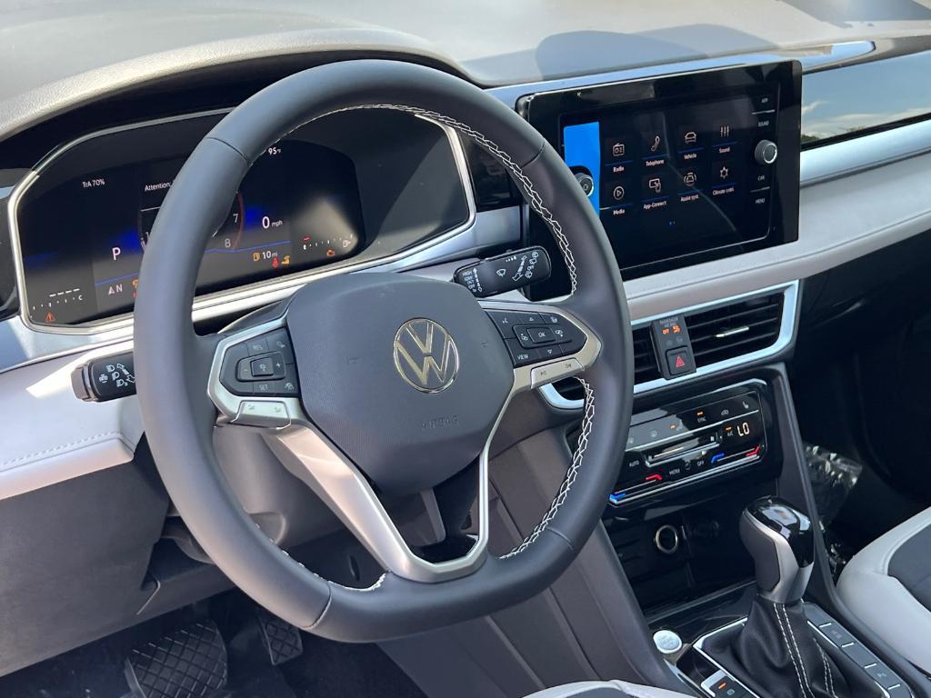 new 2025 Volkswagen Taos car, priced at $31,674