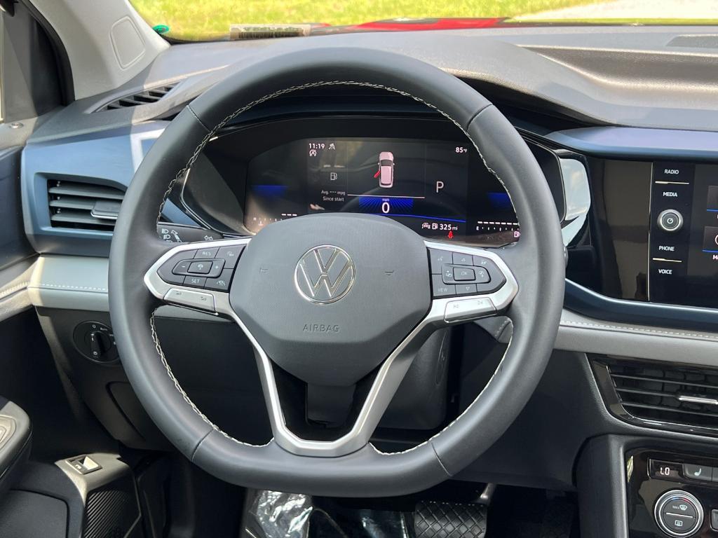 used 2024 Volkswagen Taos car, priced at $26,648