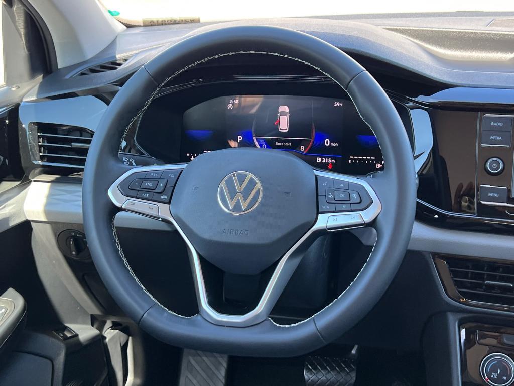 used 2023 Volkswagen Taos car, priced at $18,444