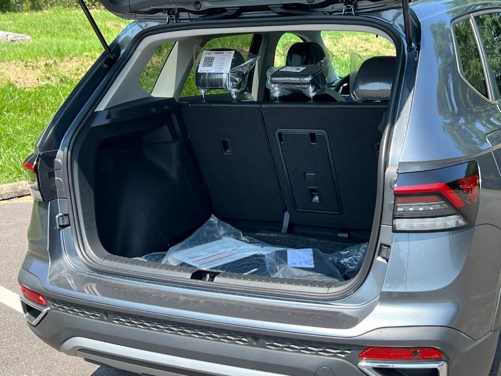 new 2025 Volkswagen Taos car, priced at $30,028