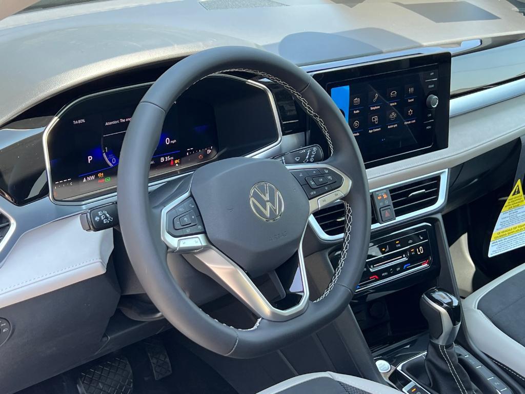 new 2025 Volkswagen Taos car, priced at $30,028