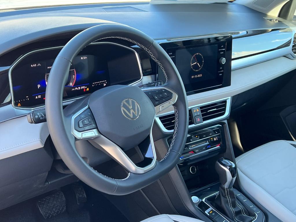 new 2025 Volkswagen Taos car, priced at $31,174