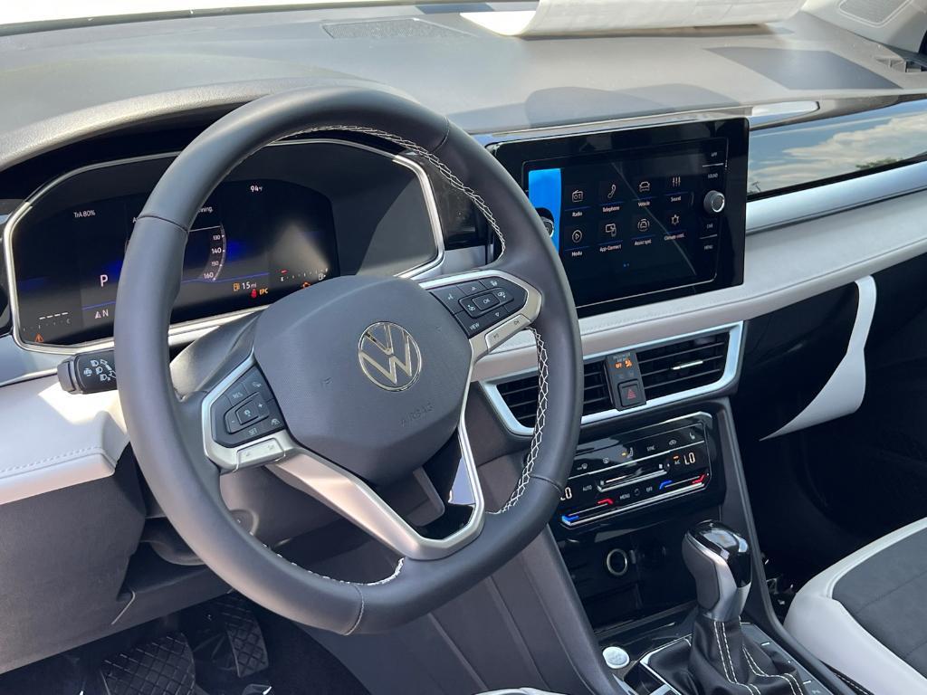 new 2025 Volkswagen Taos car, priced at $31,674