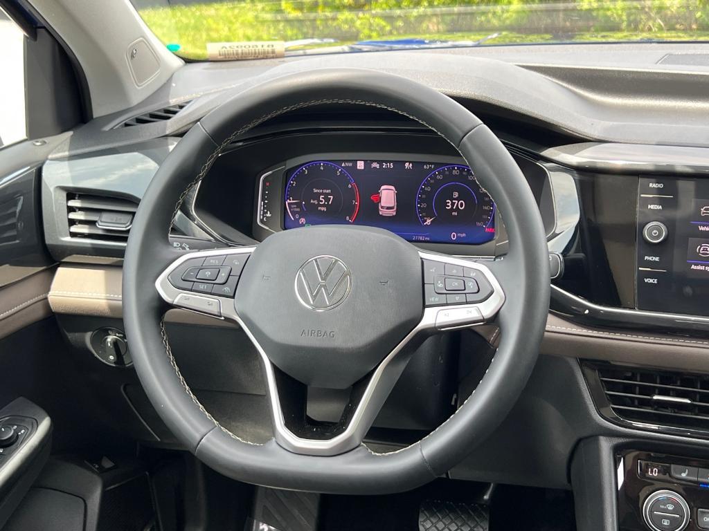used 2022 Volkswagen Taos car, priced at $23,539