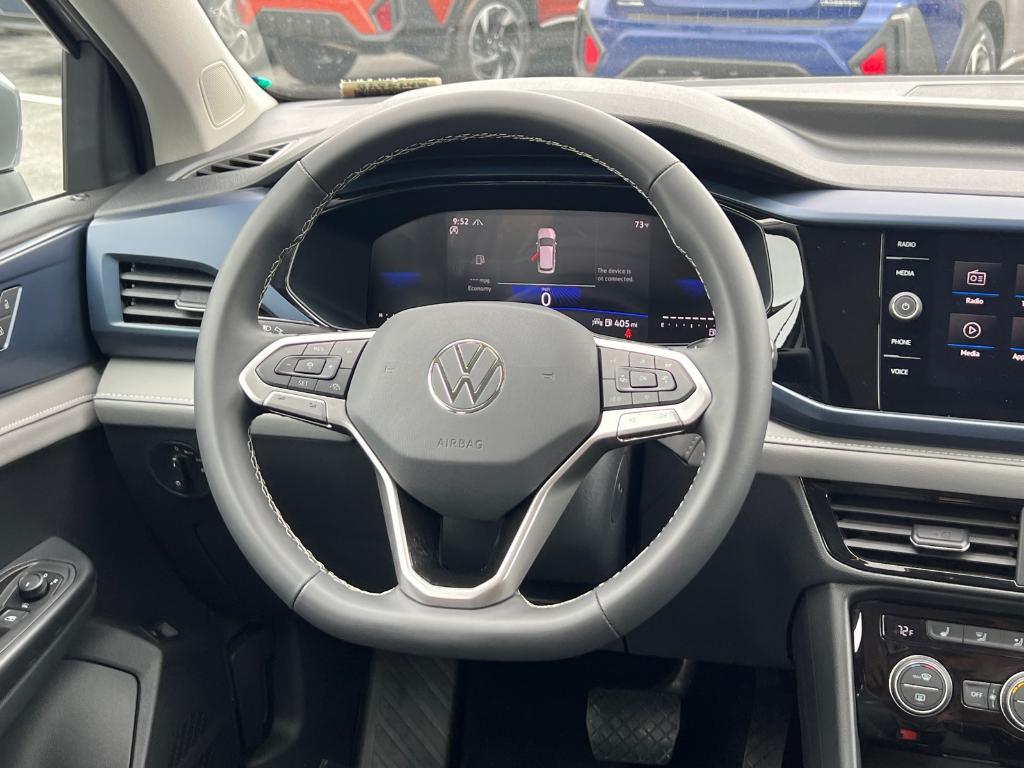 used 2024 Volkswagen Taos car, priced at $24,534