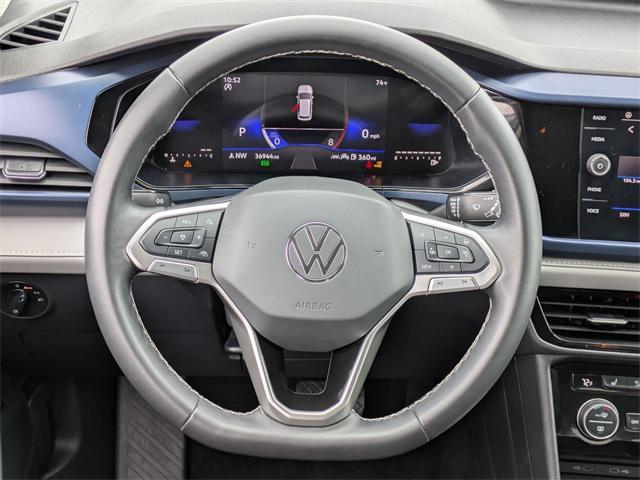 used 2024 Volkswagen Taos car, priced at $20,587
