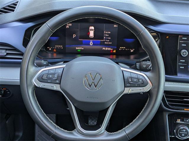 used 2024 Volkswagen Taos car, priced at $20,181