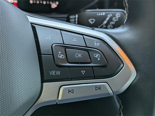 used 2024 Volkswagen Taos car, priced at $20,181