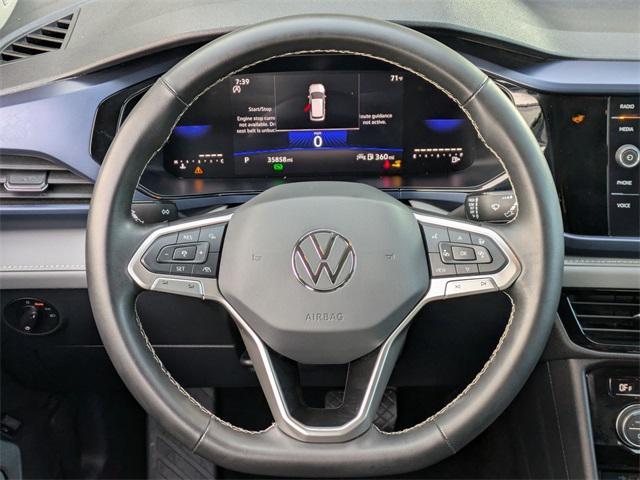 used 2024 Volkswagen Taos car, priced at $19,045