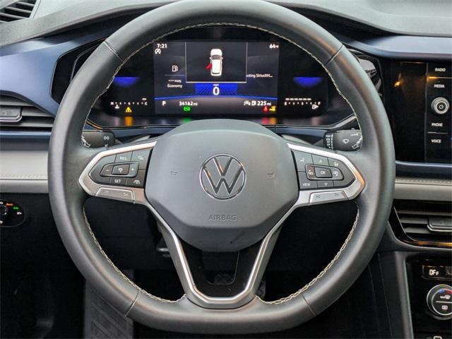 used 2024 Volkswagen Taos car, priced at $19,185
