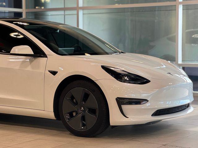 used 2023 Tesla Model 3 car, priced at $20,980