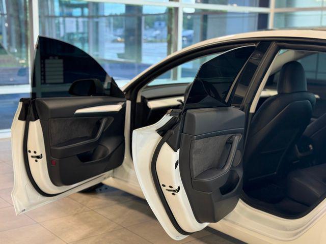 used 2023 Tesla Model 3 car, priced at $20,980