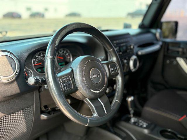 used 2013 Jeep Wrangler Unlimited car, priced at $19,480