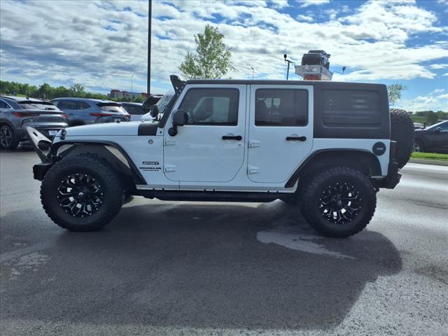 used 2015 Jeep Wrangler Unlimited car, priced at $21,987