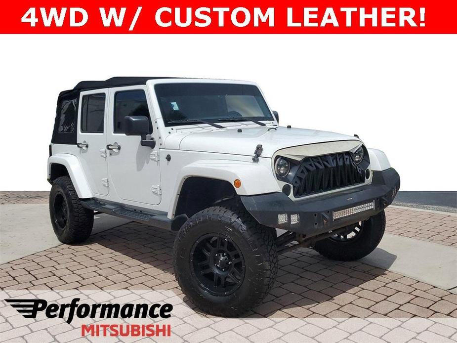 used 2016 Jeep Wrangler Unlimited car, priced at $21,017