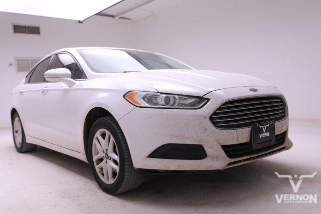 used 2014 Ford Fusion car, priced at $7,999