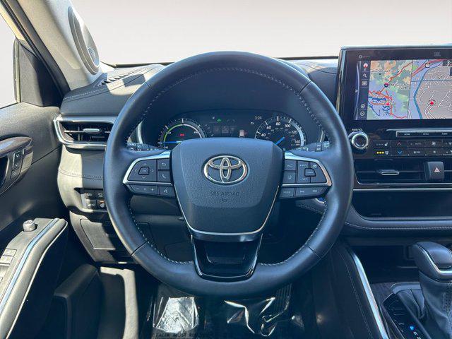used 2021 Toyota Highlander Hybrid car, priced at $49,998