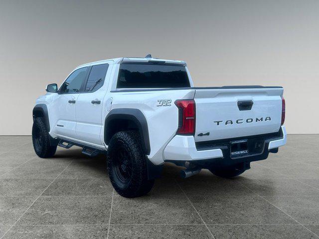 used 2024 Toyota Tacoma car, priced at $49,999