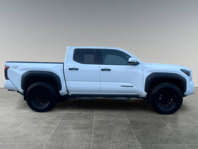 used 2024 Toyota Tacoma car, priced at $49,999