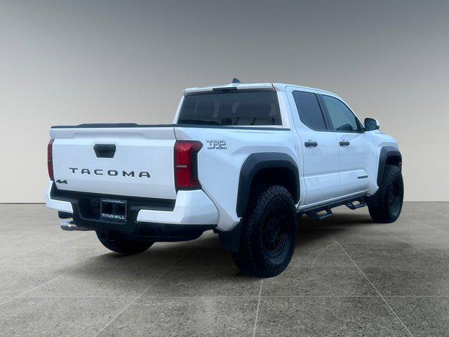 used 2024 Toyota Tacoma car, priced at $49,999