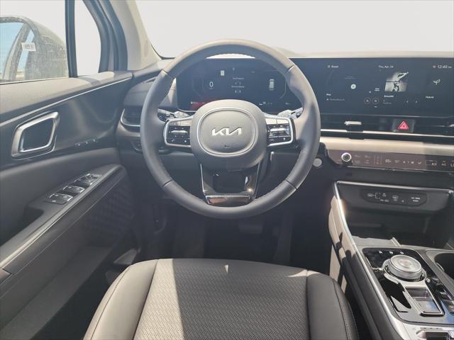 new 2025 Kia Carnival Hybrid car, priced at $55,896