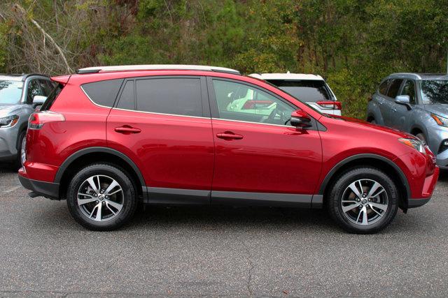 used 2018 Toyota RAV4 car, priced at $23,999