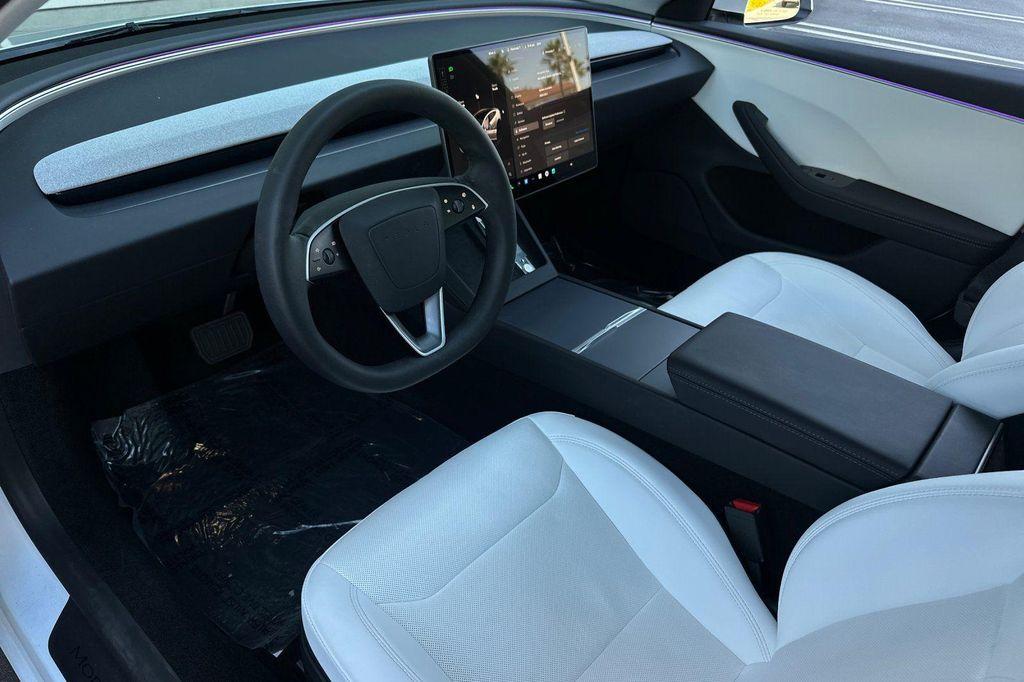 used 2025 Tesla Model 3 car, priced at $37,483
