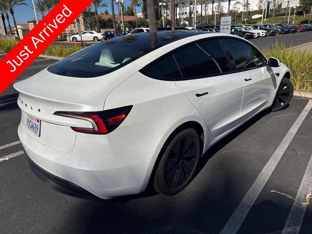 used 2025 Tesla Model 3 car, priced at $38,994
