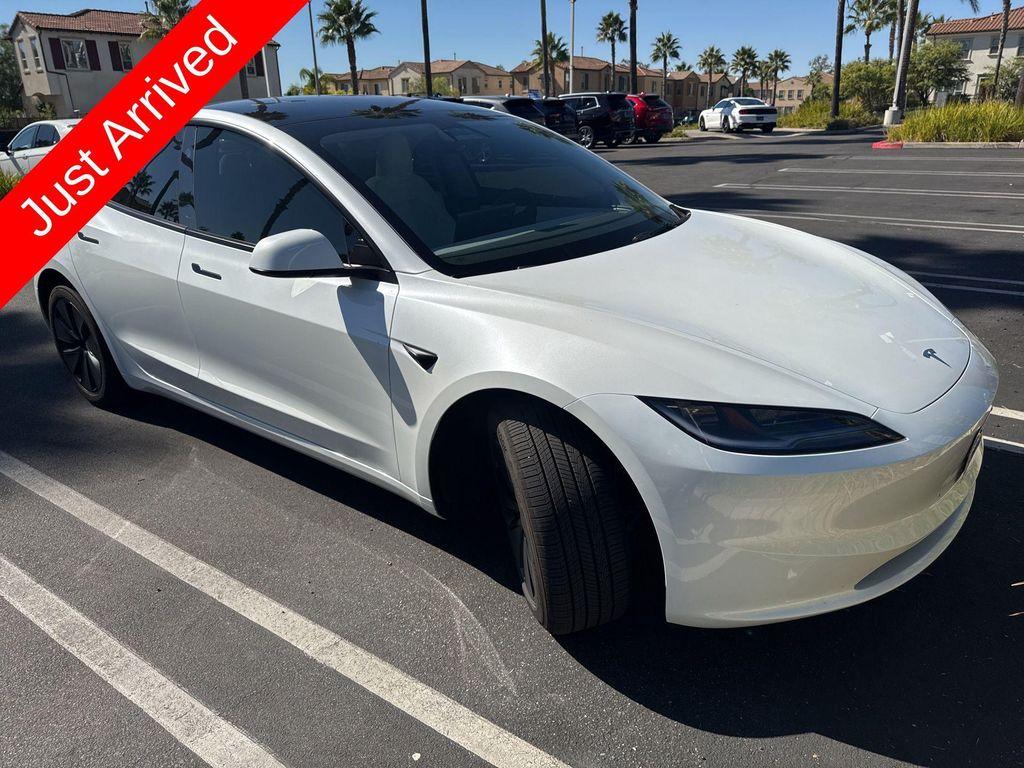 used 2025 Tesla Model 3 car, priced at $38,994