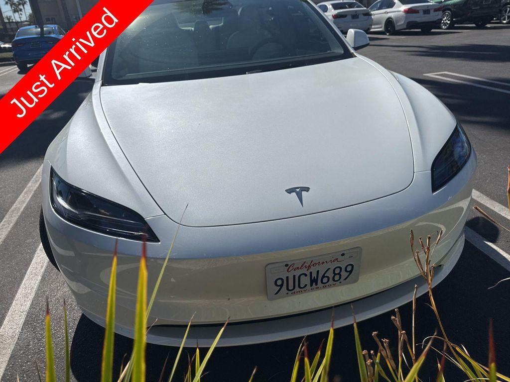 used 2025 Tesla Model 3 car, priced at $38,994
