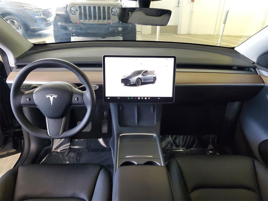 used 2024 Tesla Model Y car, priced at $32,890