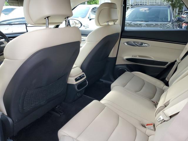 used 2023 Genesis GV70 car, priced at $37,490