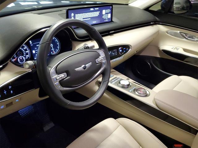 used 2023 Genesis GV70 car, priced at $37,490