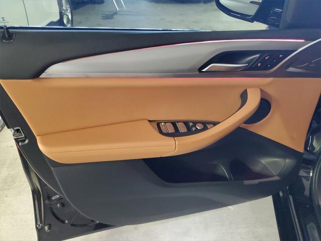 used 2022 BMW X4 car, priced at $40,490