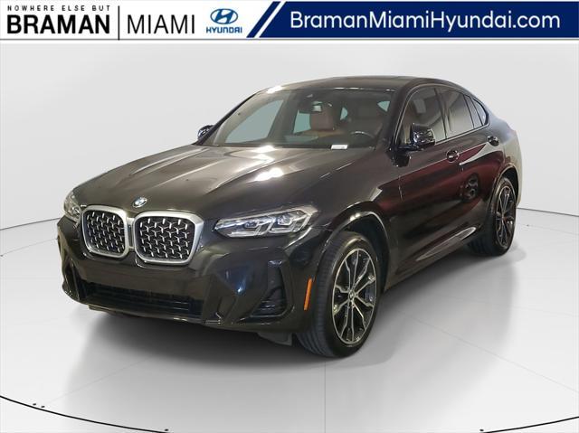 used 2022 BMW X4 car, priced at $40,490