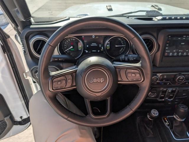 used 2023 Jeep Wrangler 4xe car, priced at $27,743