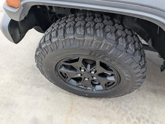 used 2023 Jeep Wrangler 4xe car, priced at $27,743