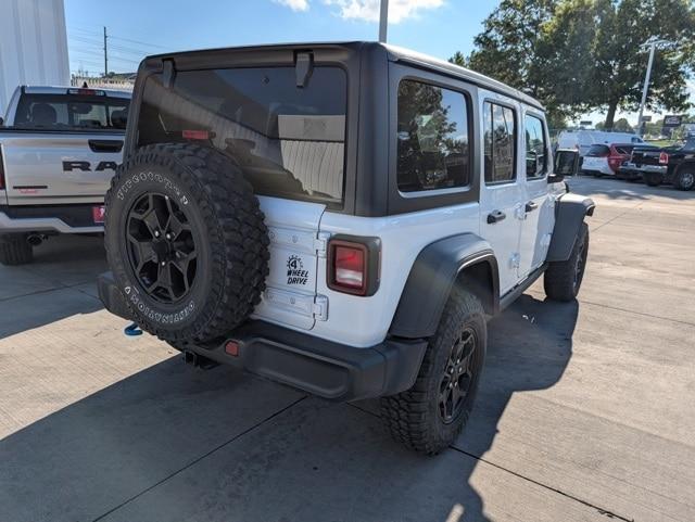 used 2023 Jeep Wrangler 4xe car, priced at $27,743