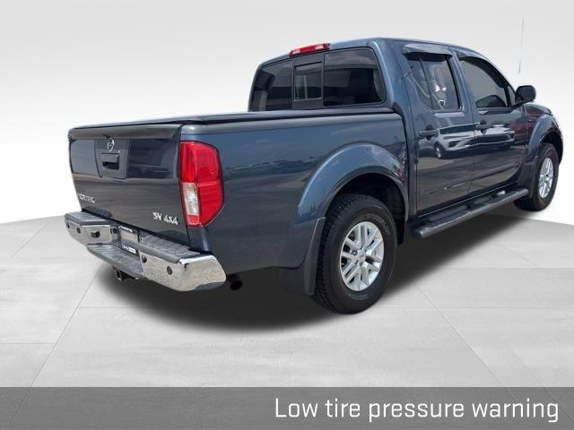 used 2014 Nissan Frontier car, priced at $14,000