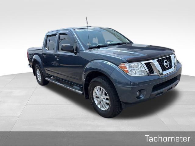 used 2014 Nissan Frontier car, priced at $14,000