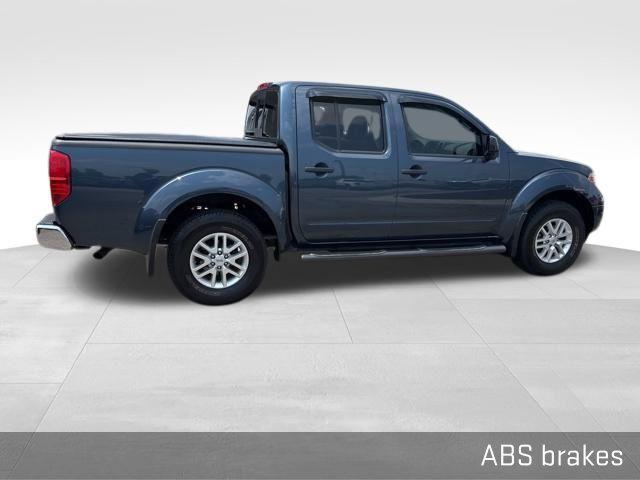 used 2014 Nissan Frontier car, priced at $14,000