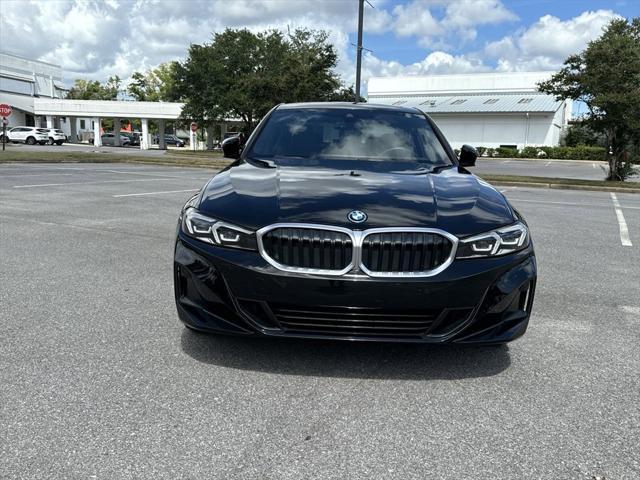 used 2023 BMW 330e car, priced at $32,656