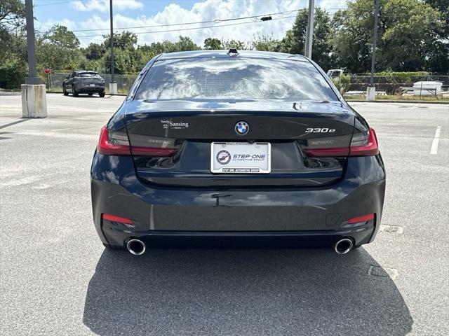 used 2023 BMW 330e car, priced at $32,656