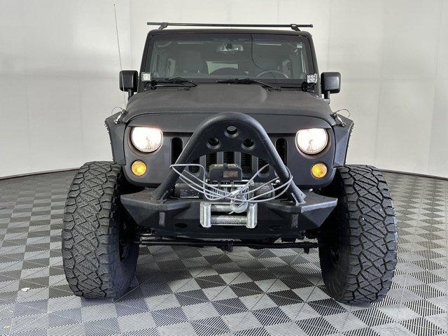 used 2014 Jeep Wrangler Unlimited car, priced at $20,999