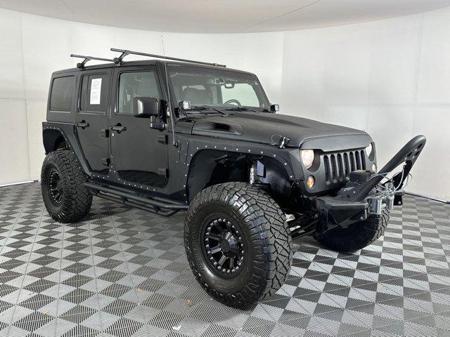 used 2014 Jeep Wrangler Unlimited car, priced at $20,999