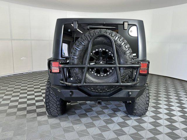 used 2014 Jeep Wrangler Unlimited car, priced at $20,999