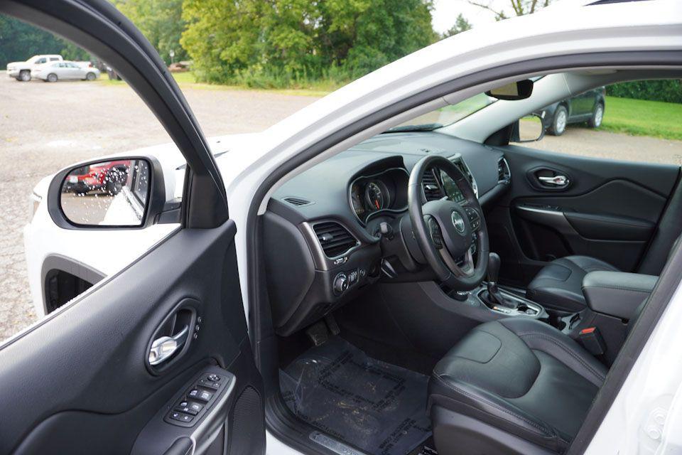 used 2021 Jeep Cherokee car, priced at $24,693