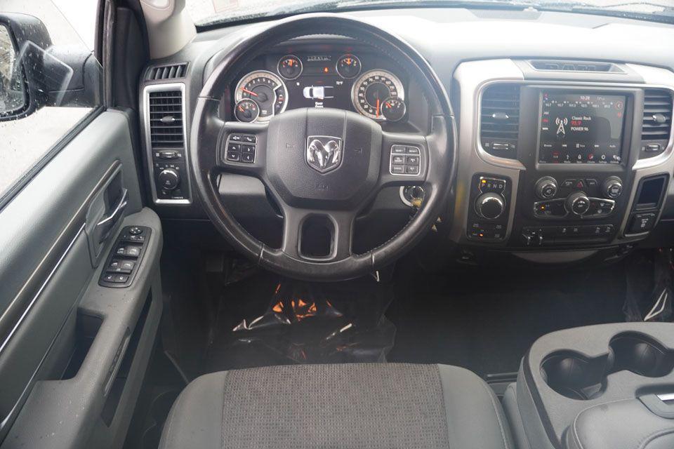 used 2018 Ram 1500 car, priced at $19,437