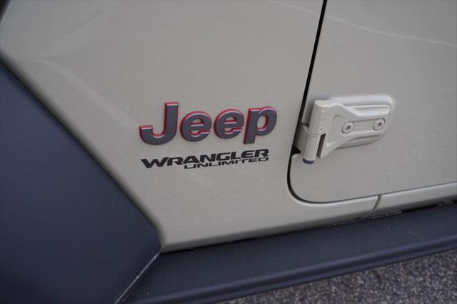 used 2022 Jeep Wrangler Unlimited car, priced at $31,558