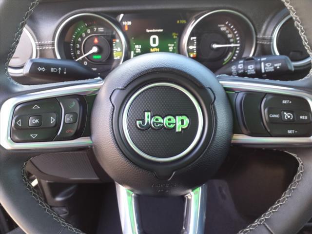 used 2023 Jeep Wrangler 4xe car, priced at $33,880